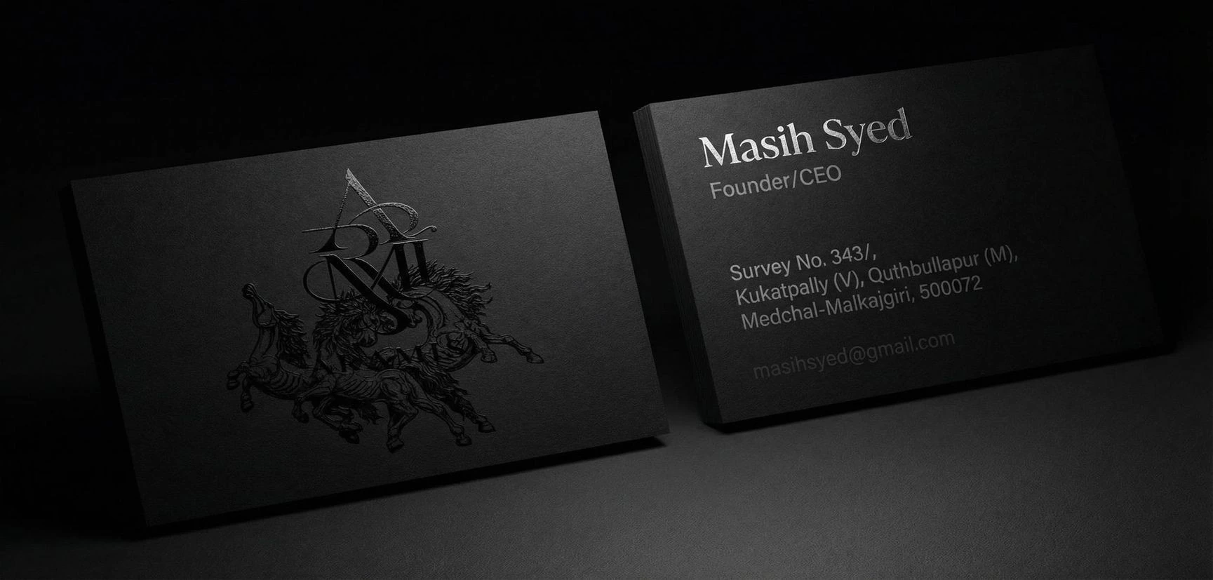 Dark correspondence cards carrying the Aramis identity.