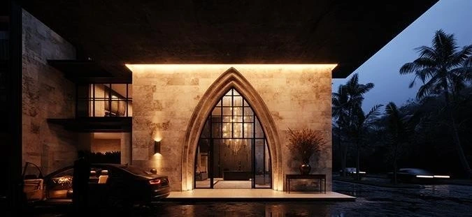 A pointed-arch building at dusk.