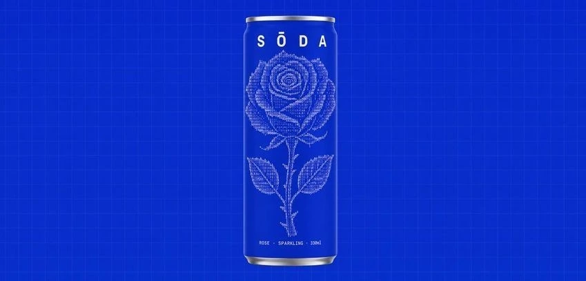 Botanical linework on a cobalt SŌDA can.