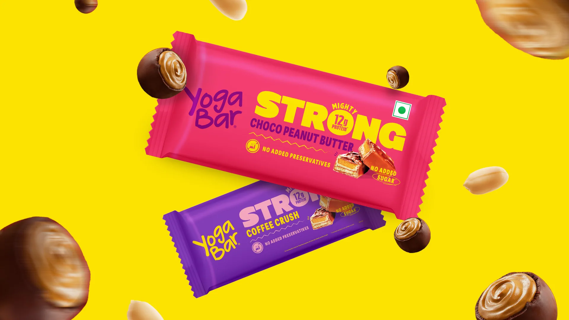 Yogabar Strong range packaging in yellow and pink.